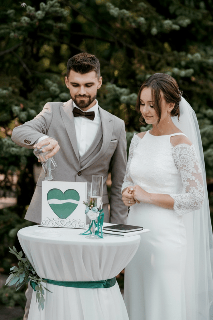 A romantic outdoor wedding ceremony photo similar to the current image, but with no visible red text or writing anywhere in the image.